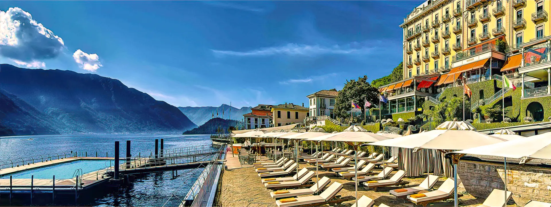 View of Grand Hotel Tremezzo Lake Como's historic palace and picturesque gardens