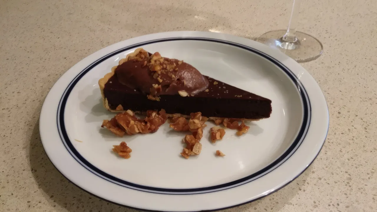 Irresistible dark chocolate tart at North Italia, a sinful dessert indulgence