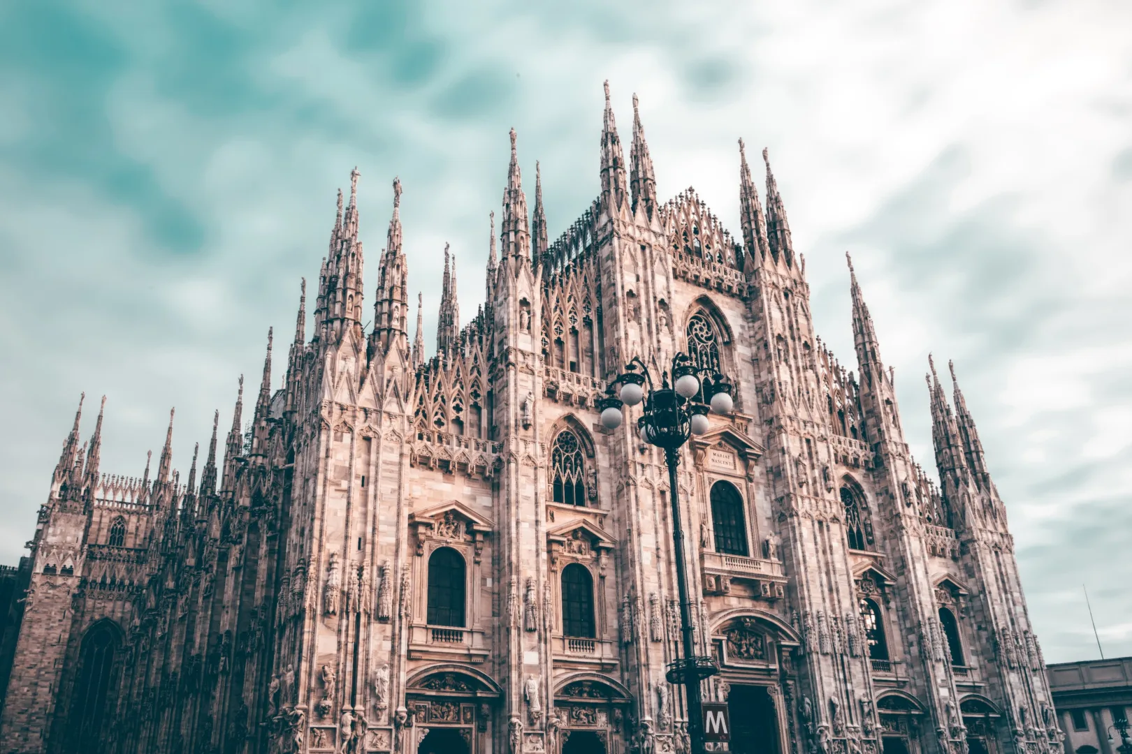 The breathtaking Duomo Milan, a Gothic architectural marvel, stands tall against the sky